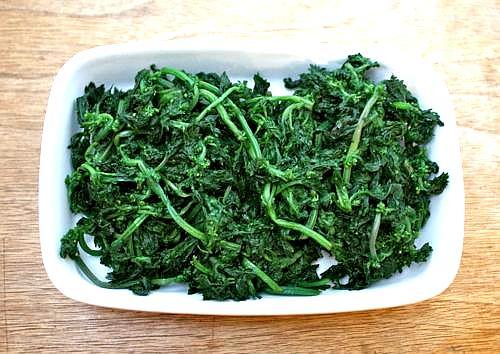 Sauteed stinging Nettle (Thafai) leaves. Image courtesy of Spruce eats